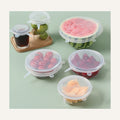 Silicone food huggers sealing produce