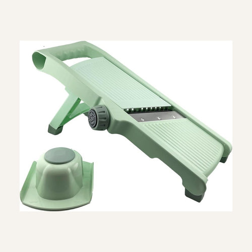 Adjustable mandoline with hand guard