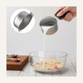 Adjustable measuring cup pouring