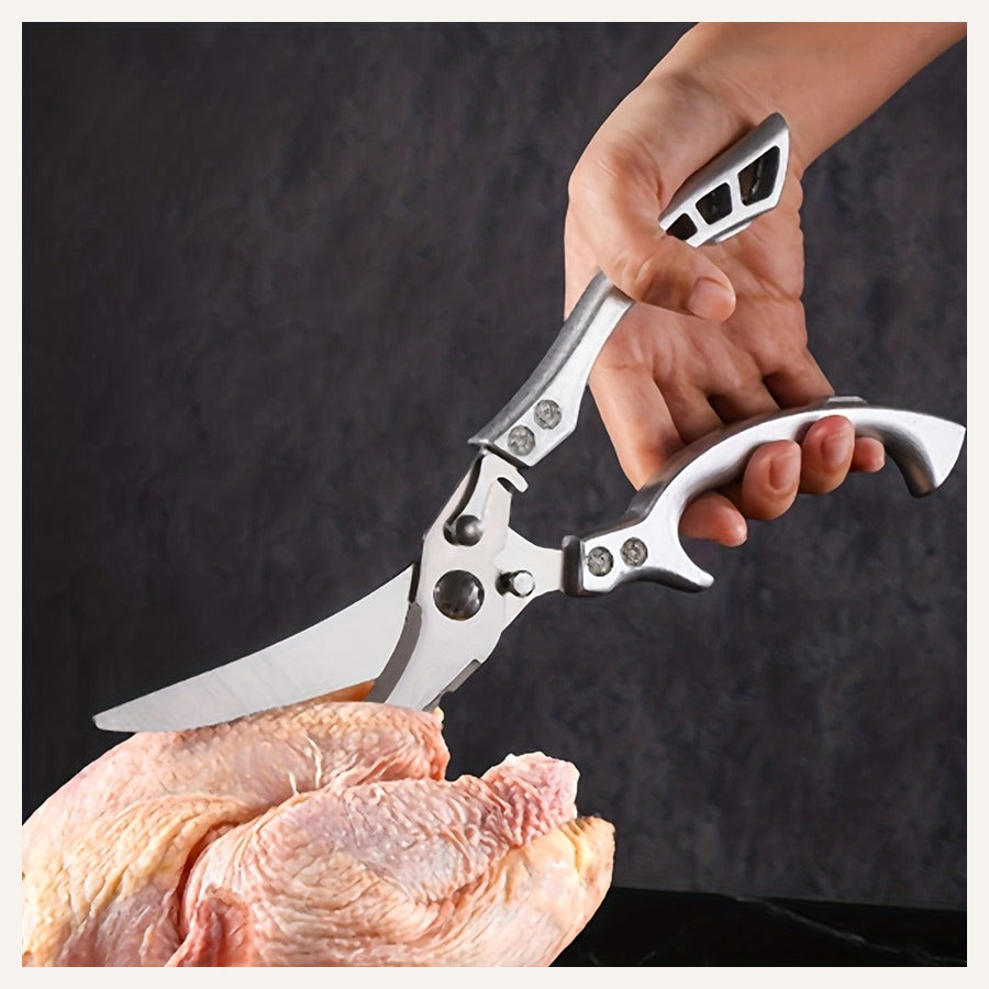 Heavy-duty kitchen shears cutting poultry